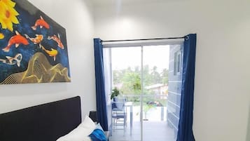 Deluxe Room, 1 Queen Bed, Balcony, Pool View