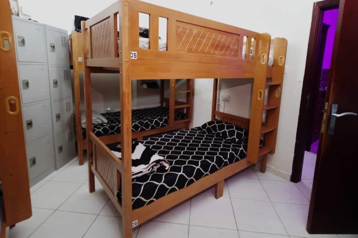 Shared Dormitory | Premium bedding, memory foam beds, blackout drapes