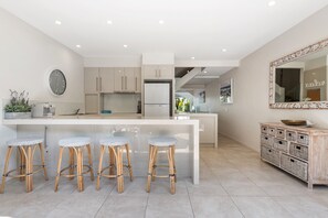 Fridge, microwave, oven, stovetop - Unit 37 - 2 Bedroom Deluxe Waterfront Townhouse (Noosaville)