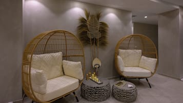 Relax in a serene space with two comfortable chairs and a stylish coffee table.