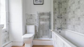 Combined shower/bathtub, deep-soaking bathtub, hair dryer