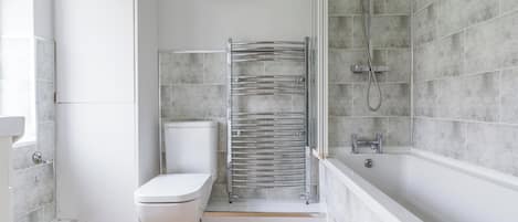 Combined shower/tub, deep soaking tub, hair dryer