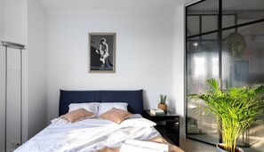 Departamento Deluxe | 1 habitación, tabla de planchar con plancha, wifi gratis y ropa de cama 