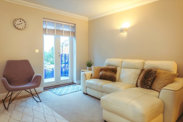 Lounge on first floor with balcony access