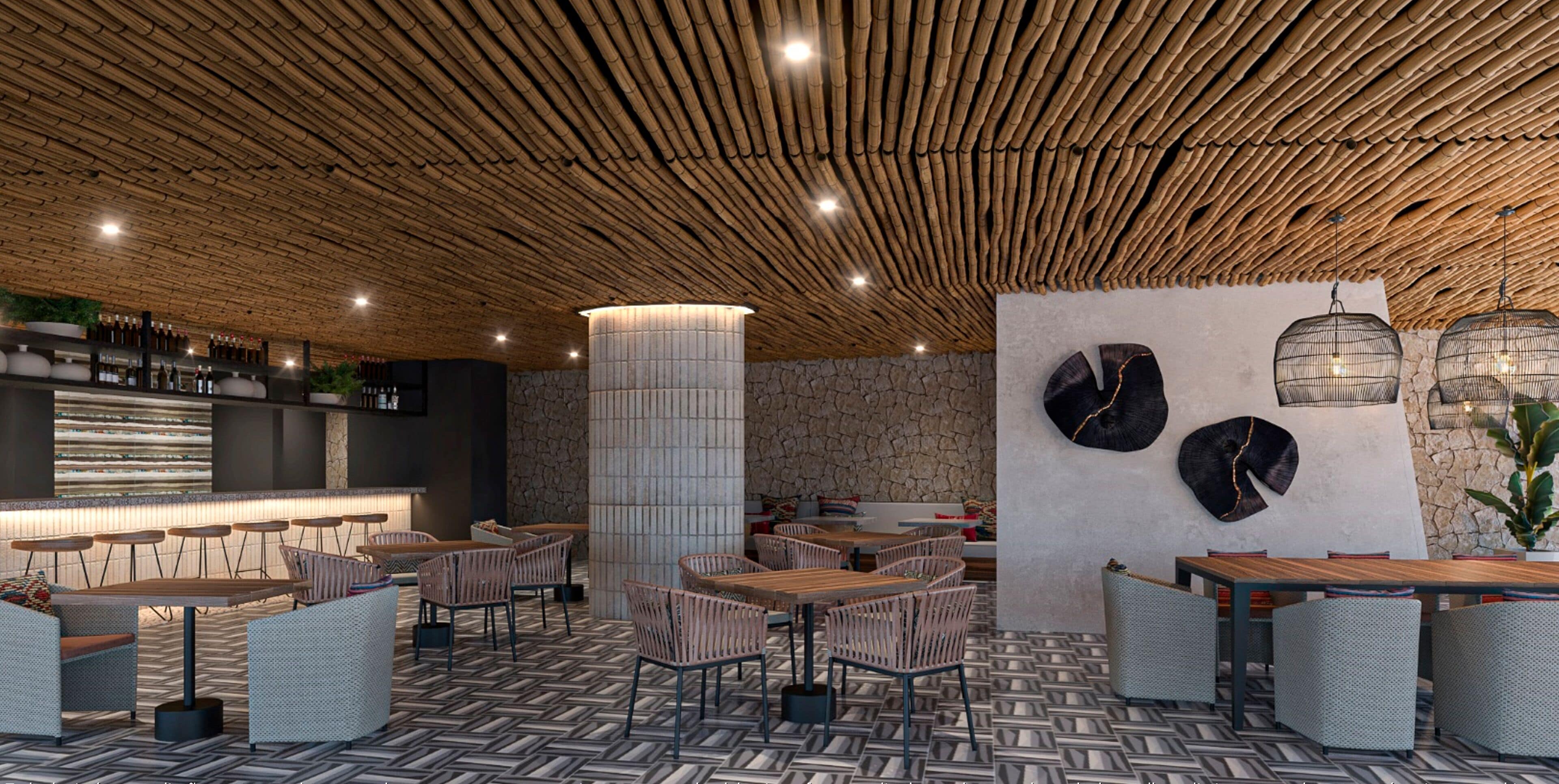 Ein modernes Restaurant mit Bambusdecke, Steinwänden und verschiedenen Sitzgelegenheiten, darunter Tische und Stühle.