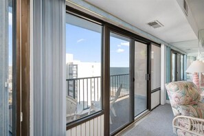 Enjoy the city and ocean views from the balcony with sliding glass doors.