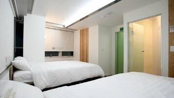 Standard Quadruple Room | Down comforters, free WiFi, bed sheets