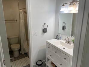 Shower, towels, soap, shampoo