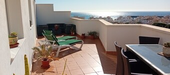 Penthouse next to the Romanilla Beach, dream terrace