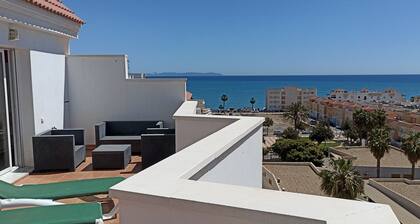 Penthouse next to the Romanilla Beach, dream terrace