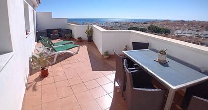 Penthouse next to the Romanilla Beach, dream terrace