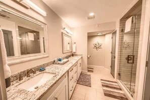 Bathtub, hair dryer, towels