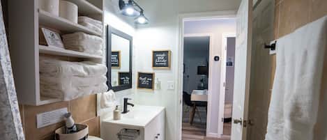 Hair dryer, towels, soap, shampoo