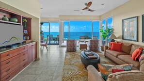 Flat-screen TV, books - Kapalua Bay Villa 21G4 By Parrish Maui - Oceanfront Views & great beach access (Lahaina)