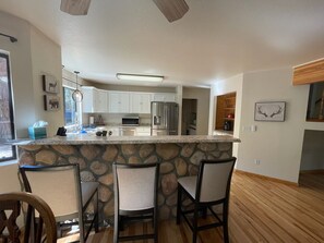 Fridge, microwave, oven, stovetop - Spacious 2-Bedroom Cabin with Patio & NFL Sunday Ticket, STR-2509-0071 (Pine)