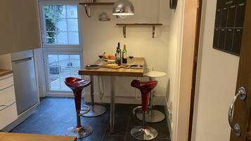 Apartment, 1 Queen Bed | Private kitchen | Fridge, microwave, oven, stovetop