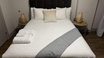 1 bedroom, desk, iron/ironing board, travel cot