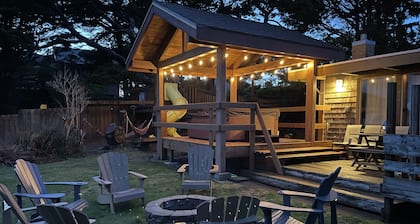 Beach Retreat House w/Ocean Views, Covered Hot Tub, & Large Fenced Yard