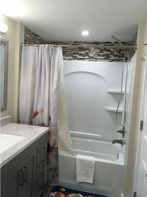 Shower, towels, soap, shampoo