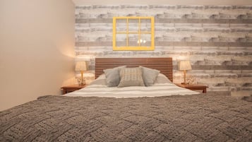 1 bedroom, desk, iron/ironing board, travel crib