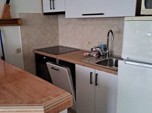 Fridge, microwave, stovetop, cookware/dishes/utensils - Apartments Gordana - Two Bedroom Apartment with Balcony and Sea View (Rab)