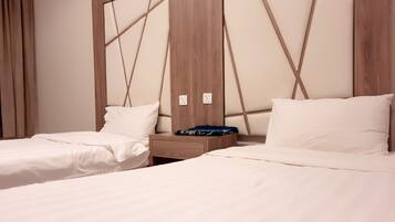 Suite Deluxe, 2 habitaciones | Ropa de cama hipoalergénica, cortinas opacas, wifi gratis y ropa de cama