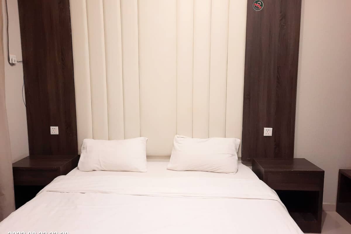 Habitación doble Deluxe | Ropa de cama hipoalergénica, cortinas blackout y wifi gratis