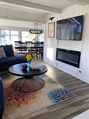 Smart TV, fireplace, books