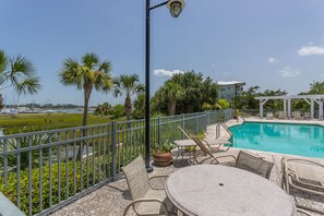 A heated pool - Gorgeous Views of the Inter-coastal Waterway, Dog-Friendly, Pool, Steps to Marina Docks (Saint Simons Island)