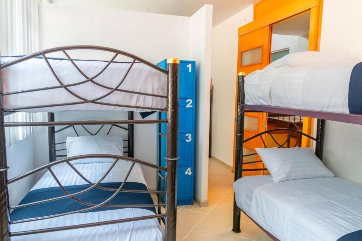 Dormitorio compartido Confort, dormitorio mixto | Caja de seguridad en la habitación, wifi gratis y ropa de cama