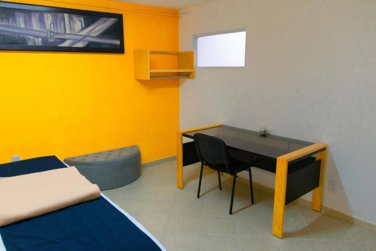 Habitación Deluxe, 1 habitación | Caja de seguridad en la habitación, wifi gratis y ropa de cama