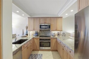 Coffee/tea maker, toaster, dining tables