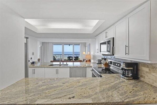 Coffee/tea maker, toaster, dining tables