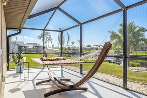 Terrace/patio - Beauty, Tranquility & Harmony. Water Views, Heated Pool - Villa Paradise - Roelens Vacations (Cape Coral)