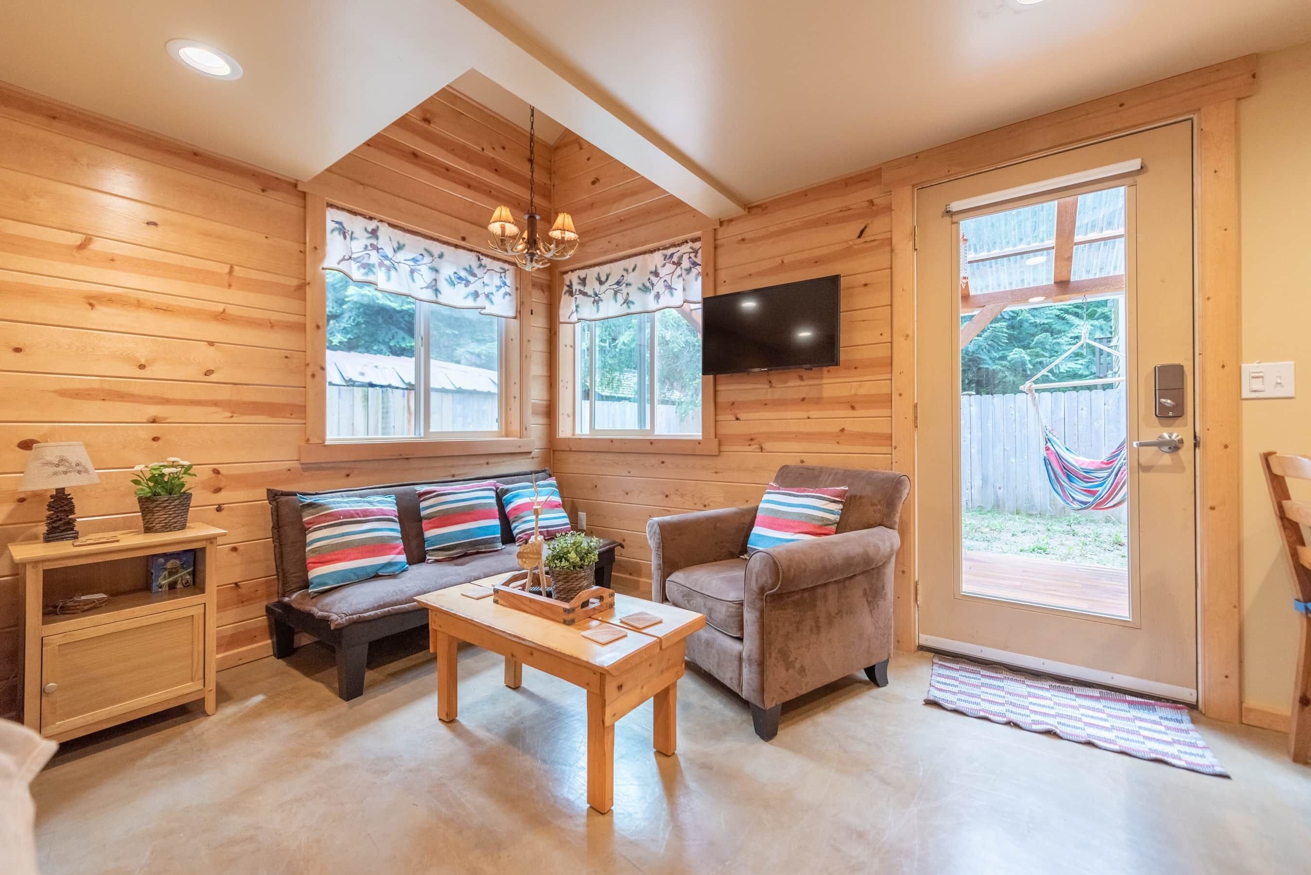 Cozy studio living area with 40" smart TV