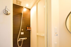 A bathroom with a shower, a mirror, and a towel rack. - Comfy Stay Sarusawaike (Nara)