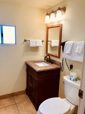 Hair dryer, towels, soap, shampoo