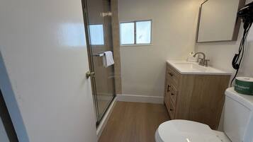Hair dryer, towels, soap, shampoo