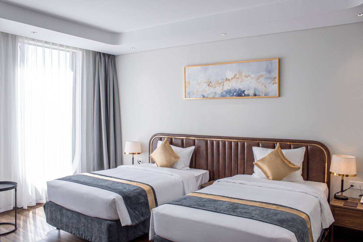 Chambre Deluxe | Minibar, espace de travail pour ordinateurs portables