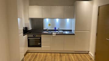 Apartment | Private kitchen | Fridge, microwave, oven, stovetop