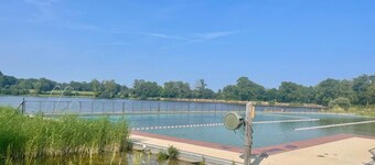 Quaint Chalet in 2-Star Camping with Terrace, Family Amenities & Activities