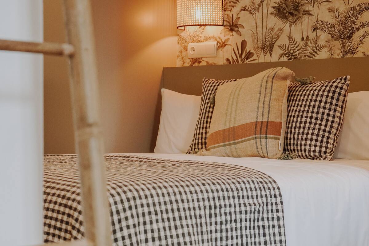 Premium bedding, down duvets, memory-foam beds, in-room safe