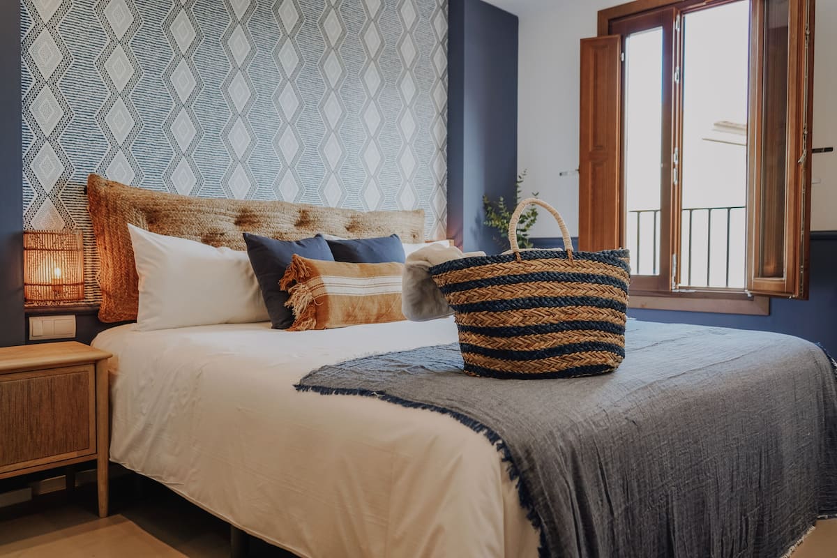 Premium bedding, down duvets, memory-foam beds, in-room safe