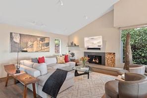 TV, fireplace, books - Stunning Panoramic Views From Contemporary Riviera Home! (Santa Barbara)