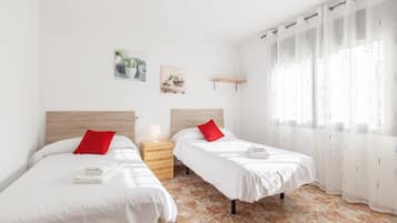 4 dormitorios, tabla de planchar con plancha, wifi gratis y ropa de cama