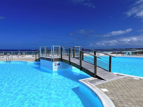 Lounge studio Zen rdc première ligne, piscine 50 mètres, plage 80 mètres !