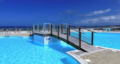 Lounge studio Zen rdc premiĂšre ligne, piscine 50 mĂštres, plage 80 mĂštres !