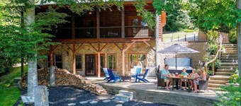Waterfront Log Cabin w/Hot Tub, Kayaks, Firepit, King Beds, & Pets OK