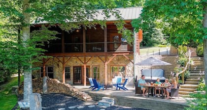 Waterfront Log Cabin w/Hot Tub, Kayaks, Firepit, King Beds, & Pets OK