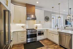 Fridge, microwave, oven, stovetop - Balconies, Bikes, & Beach Vibes | Luxe Pet-Friendly Retreat Near Lagoon Pool (Panama City Beach)